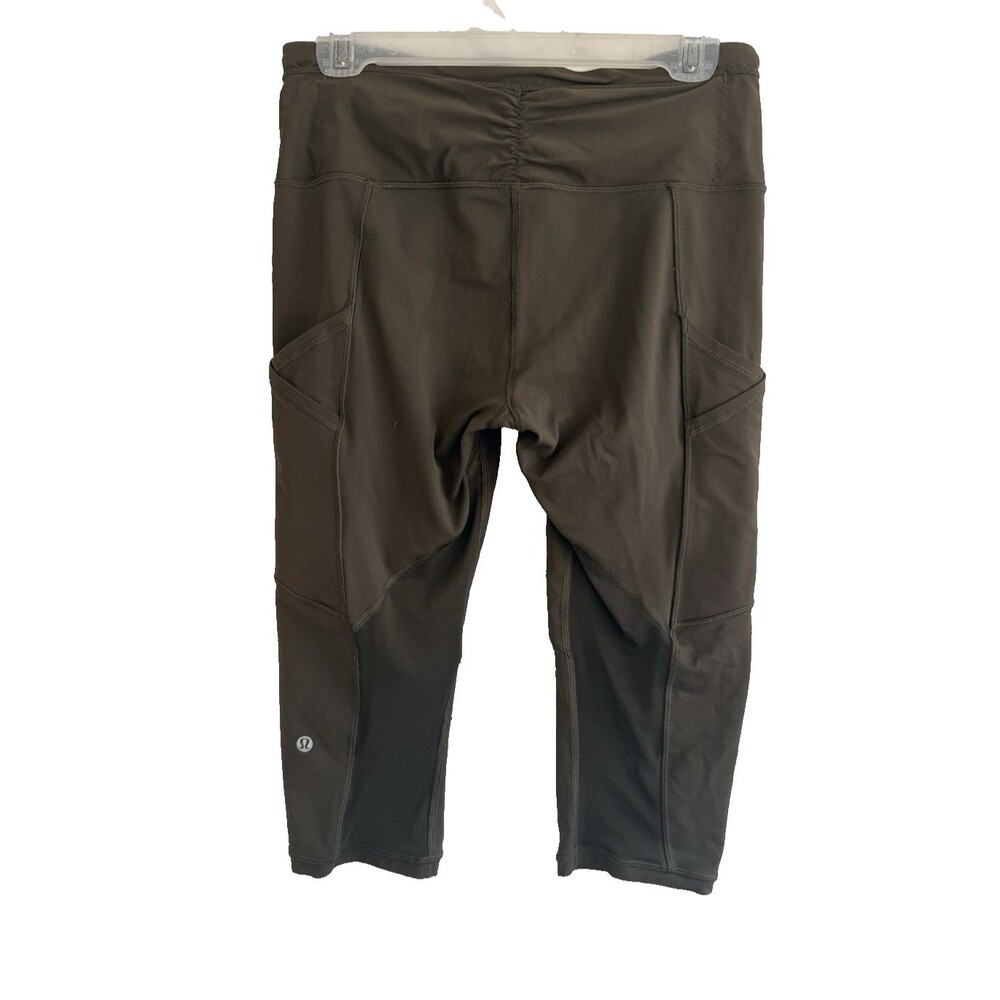 LULULEMON Leggings Size 8 Dark Green Cropped Pants Pockets Athleisure Yoga